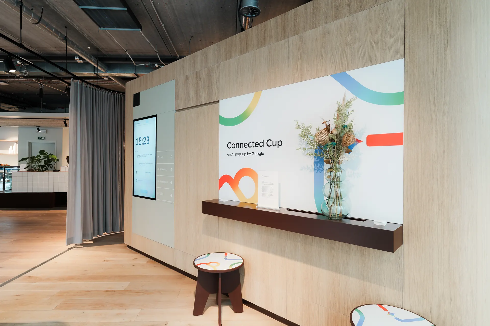The Connected Cup wall inside the pop-up, reading &ldquo;Connected Cup &mdash; an AI pop-up by Google&rdquo;