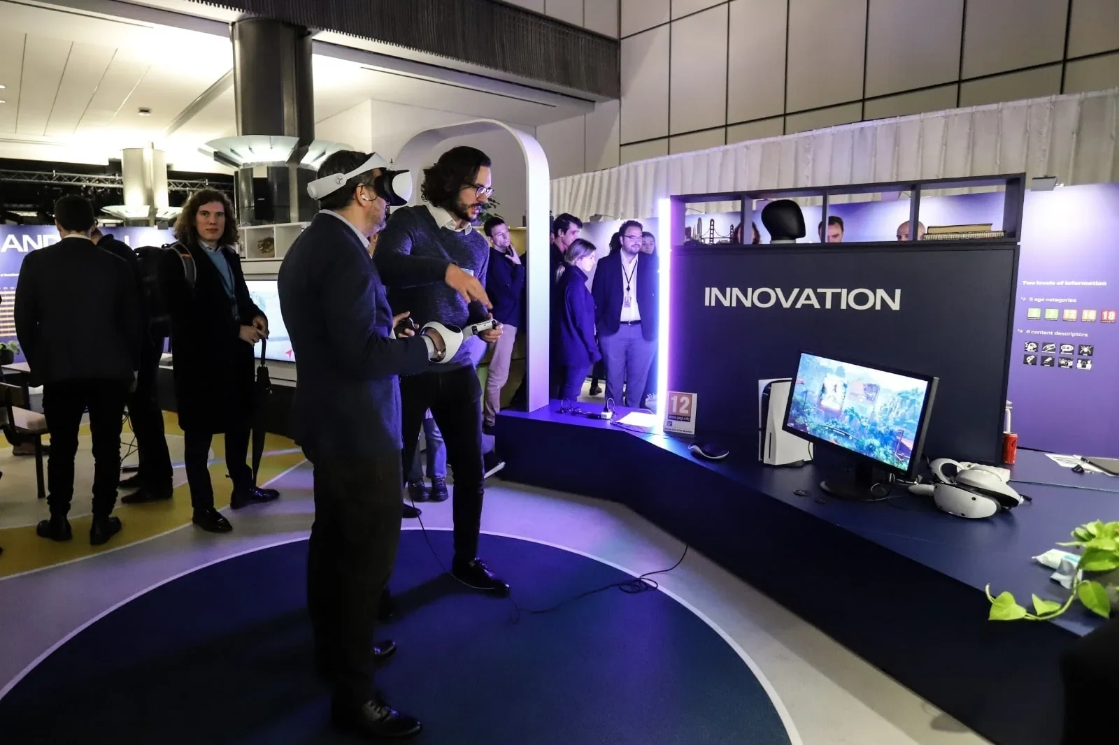 Visitors at a Bump-built exhibition stand inside the European Parliament