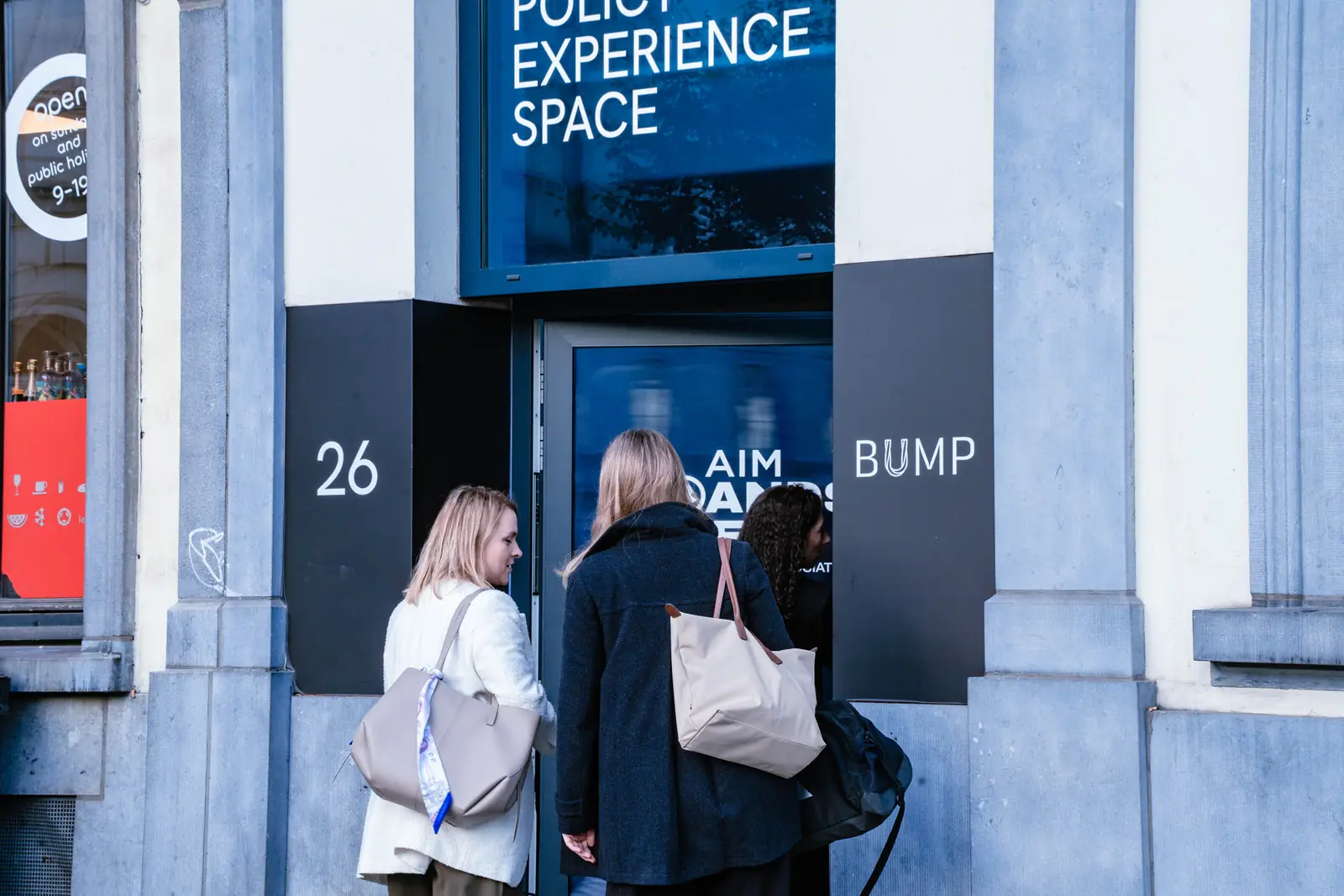 Guests arriving at the Bump Policy Experience Space, its doors dressed for AIM Brands Week
