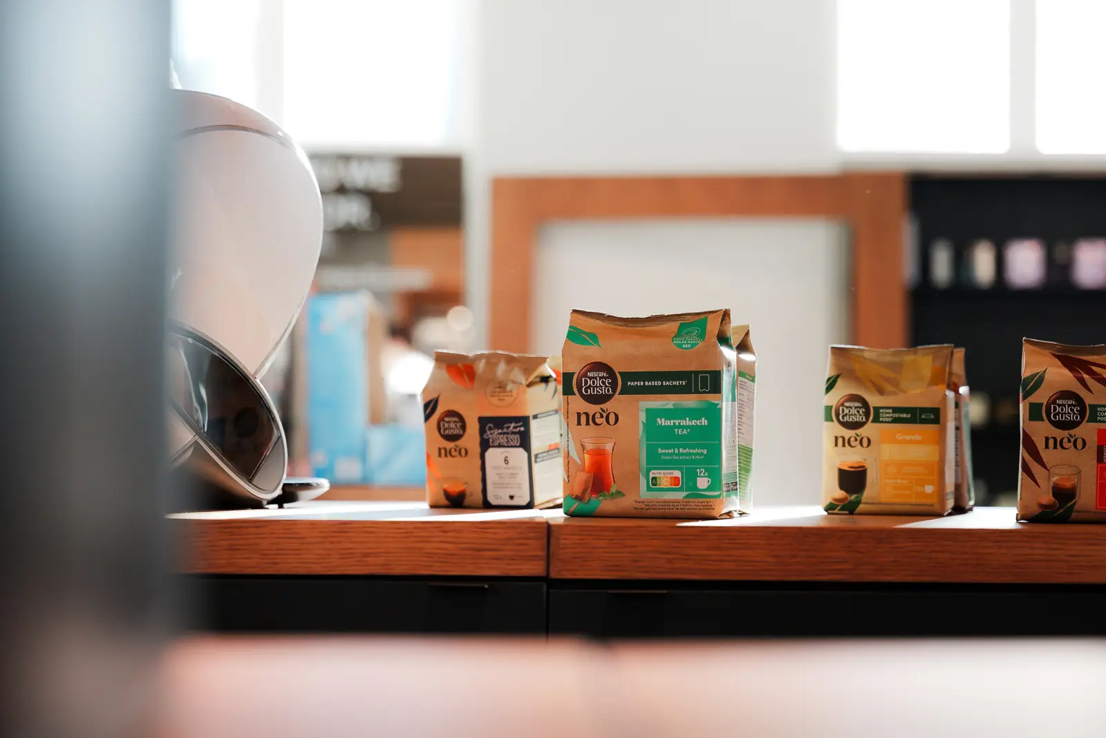 Nescaf&eacute; Dolce Gusto Neo packs on a display shelf