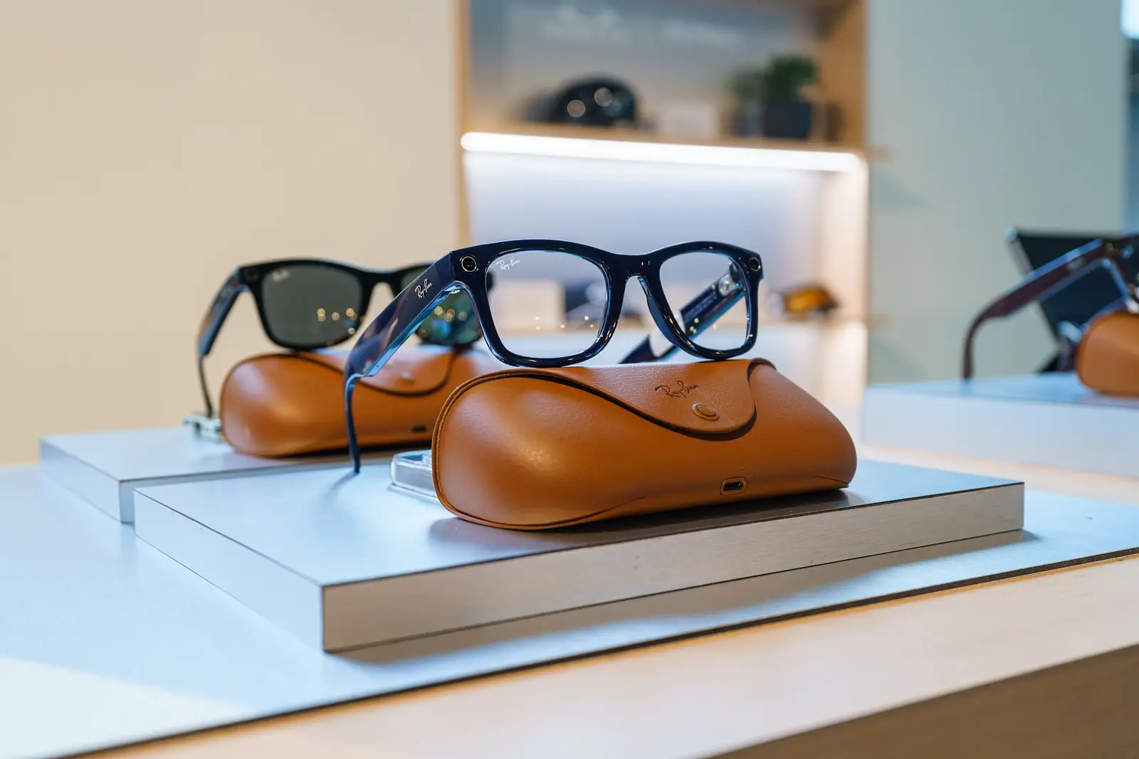 Ray-Ban Meta glasses displayed on their cases