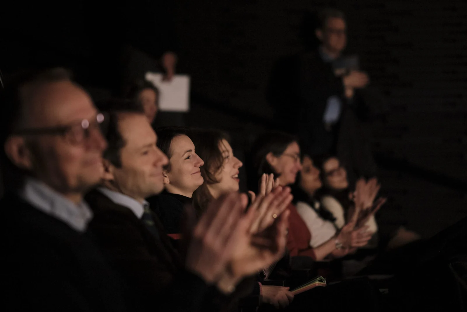 The audience applauding during a session