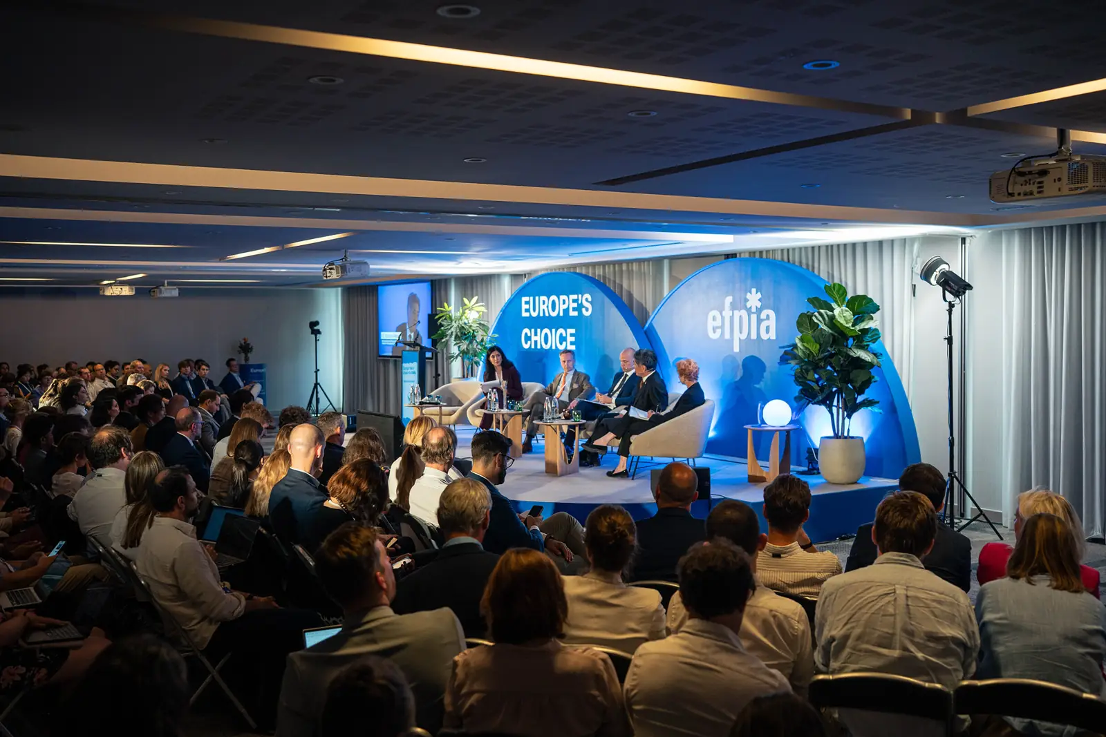 A full room during a panel at the second event
