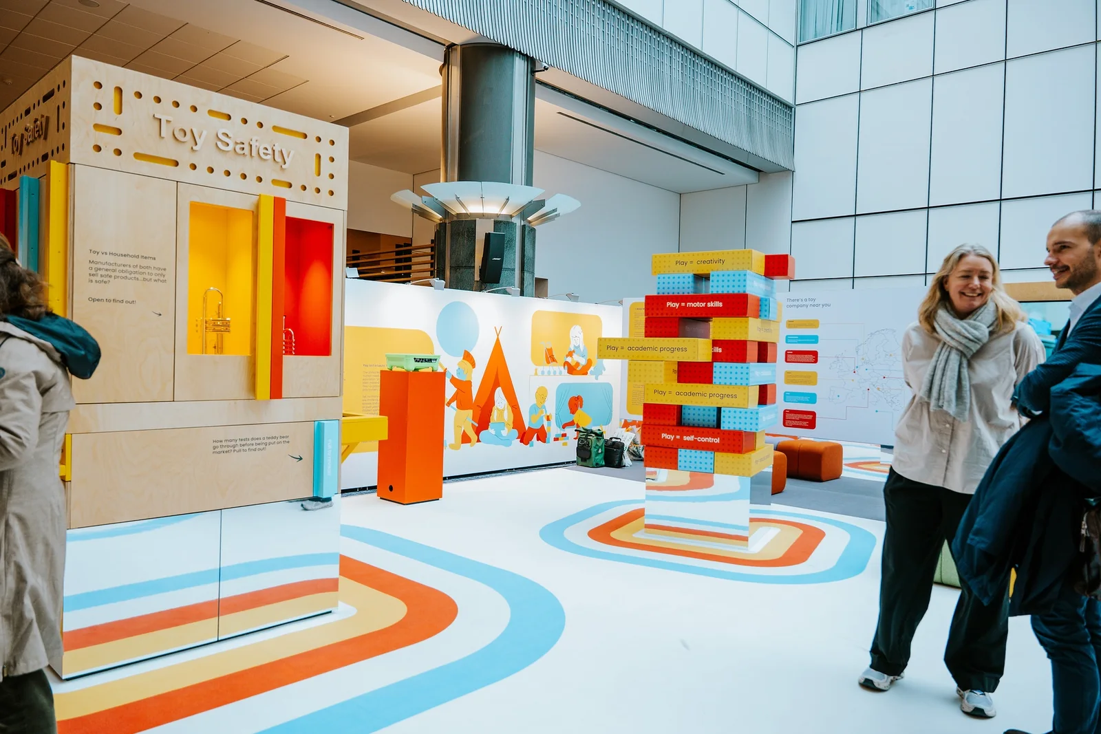 Visitors walking through the exhibition